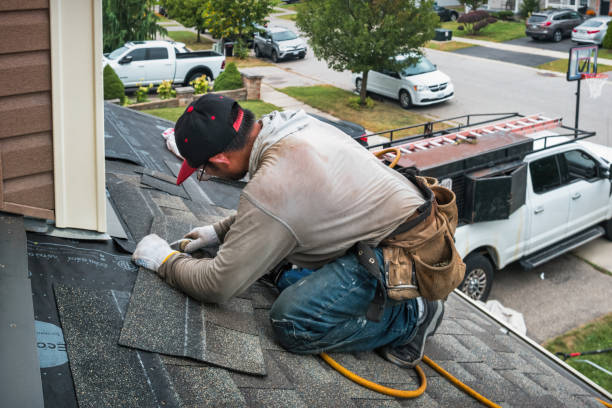 Professional Roofing technician working in Chester, UT
